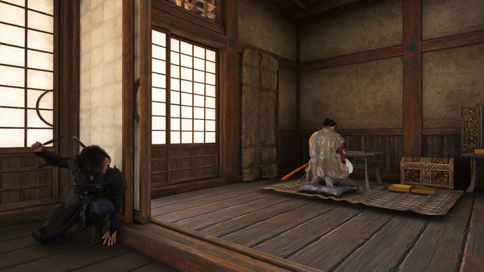 Naoe kneels and is about to take out a target in a castle in Assassin's Creed Shadows.